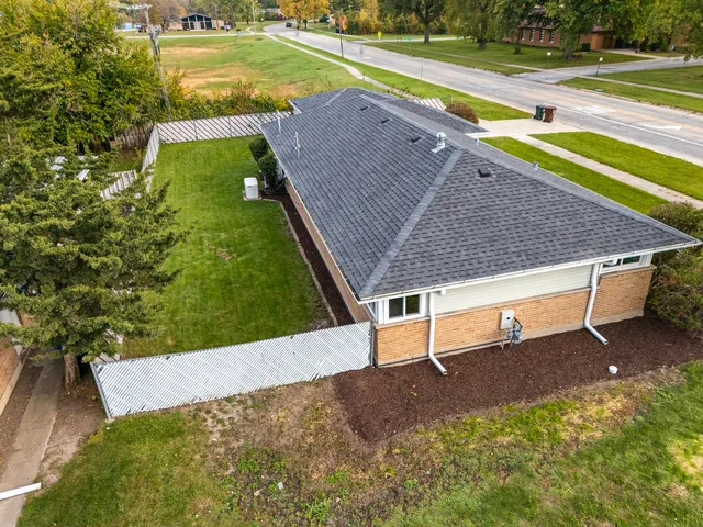 a view of a backyard with swimming pool