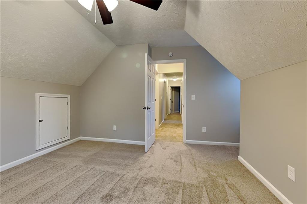 1664 Summit Pl Way Loganville, GA 30052 - Photo 19 of 23 wooden floor in an empty room