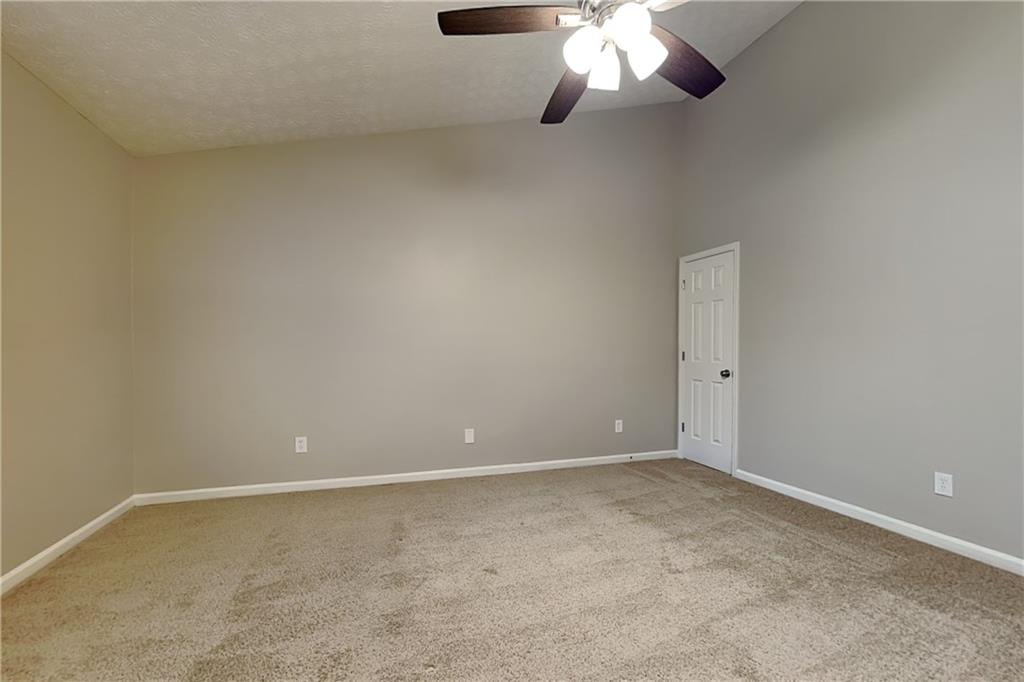 1664 Summit Pl Way Loganville, GA 30052 - Photo 10 of 23 wooden floor in an empty room
