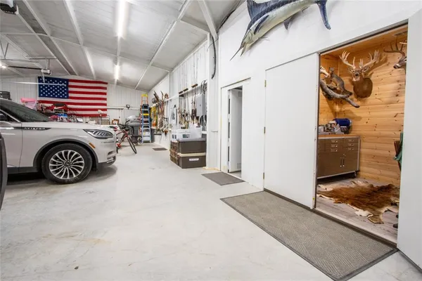 a view of a chairs and table in backyard
