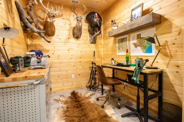 a living room with furniture and a rug