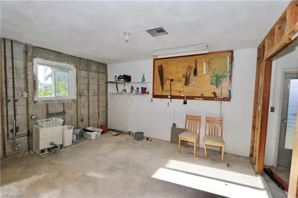 a room with table and chairs