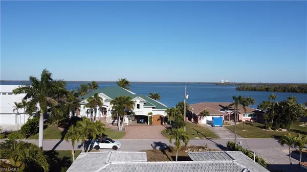 an aerial view of a house with a garden