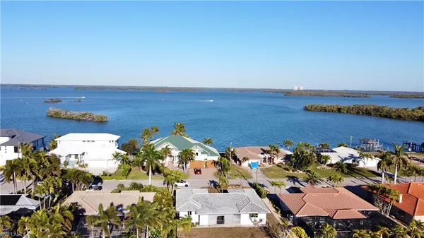 an aerial view of a houses with a outdoor space