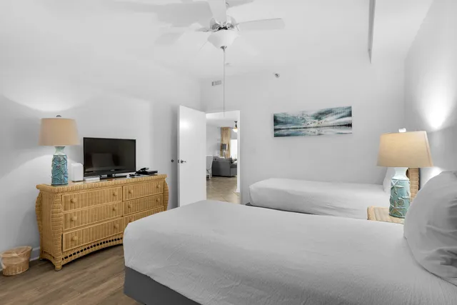 a building outdoor space with patio furniture and garden