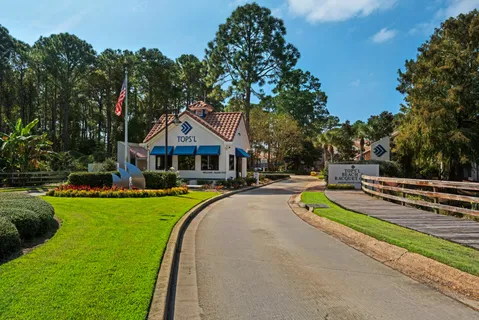 a sign that is on a brick wall