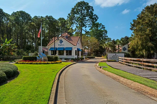 a sign that is on a brick wall