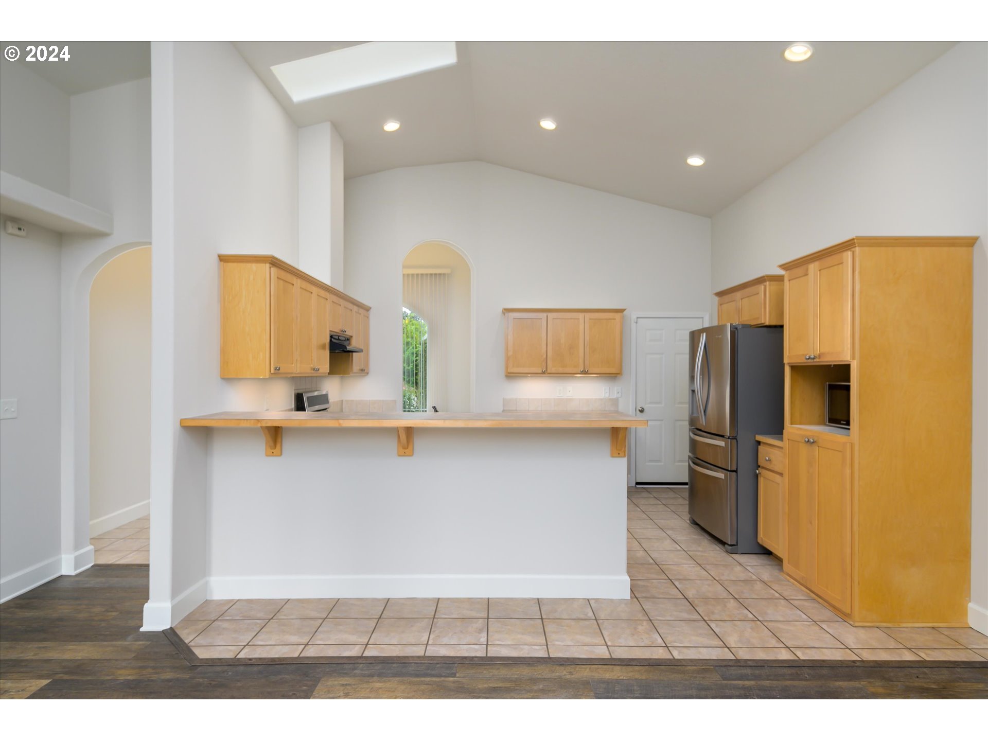 654 62nd Street Springfield, OR 97478 - Photo 13 of 41 a view of kitchen with furniture and refrigerator