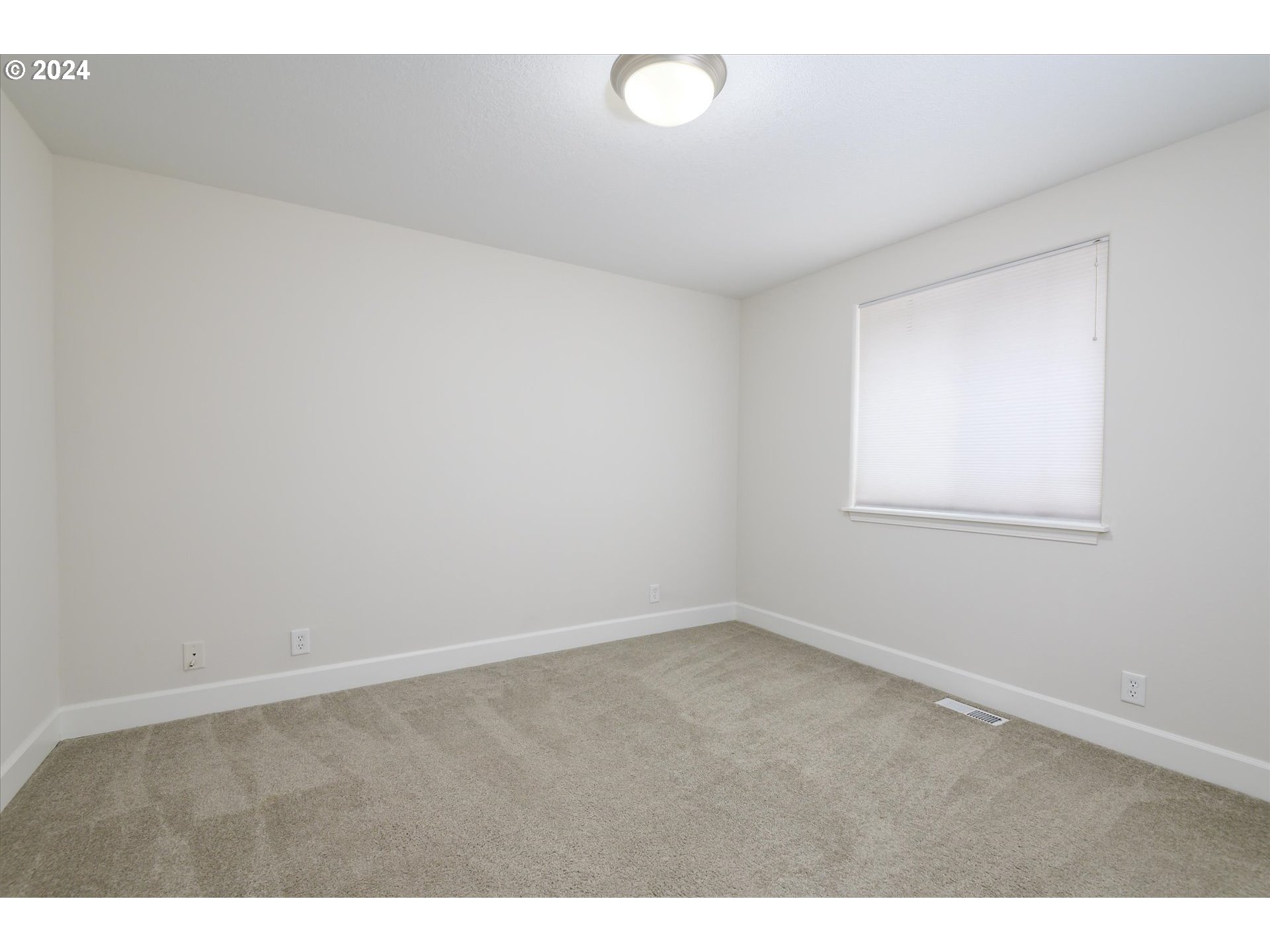 654 62nd Street Springfield, OR 97478 - Photo 28 of 41 a view of an empty room with a window