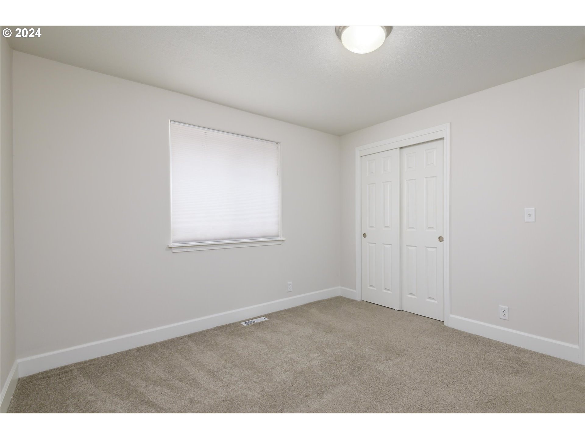 654 62nd Street Springfield, OR 97478 - Photo 29 of 41 a view of an empty room with a window