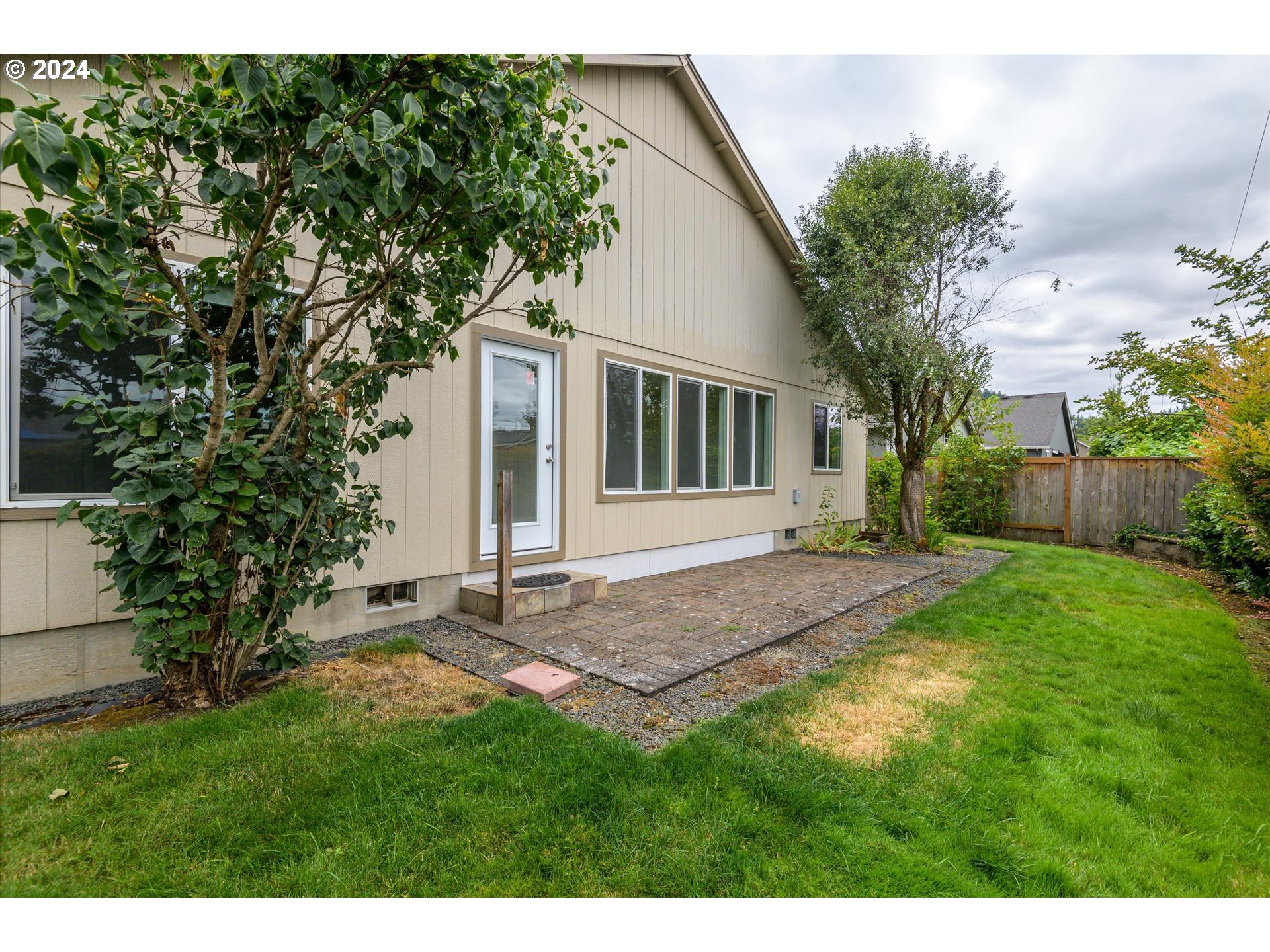 654 62nd Street Springfield, OR 97478 - Photo 30 of 41 a view of backyard of house with green space