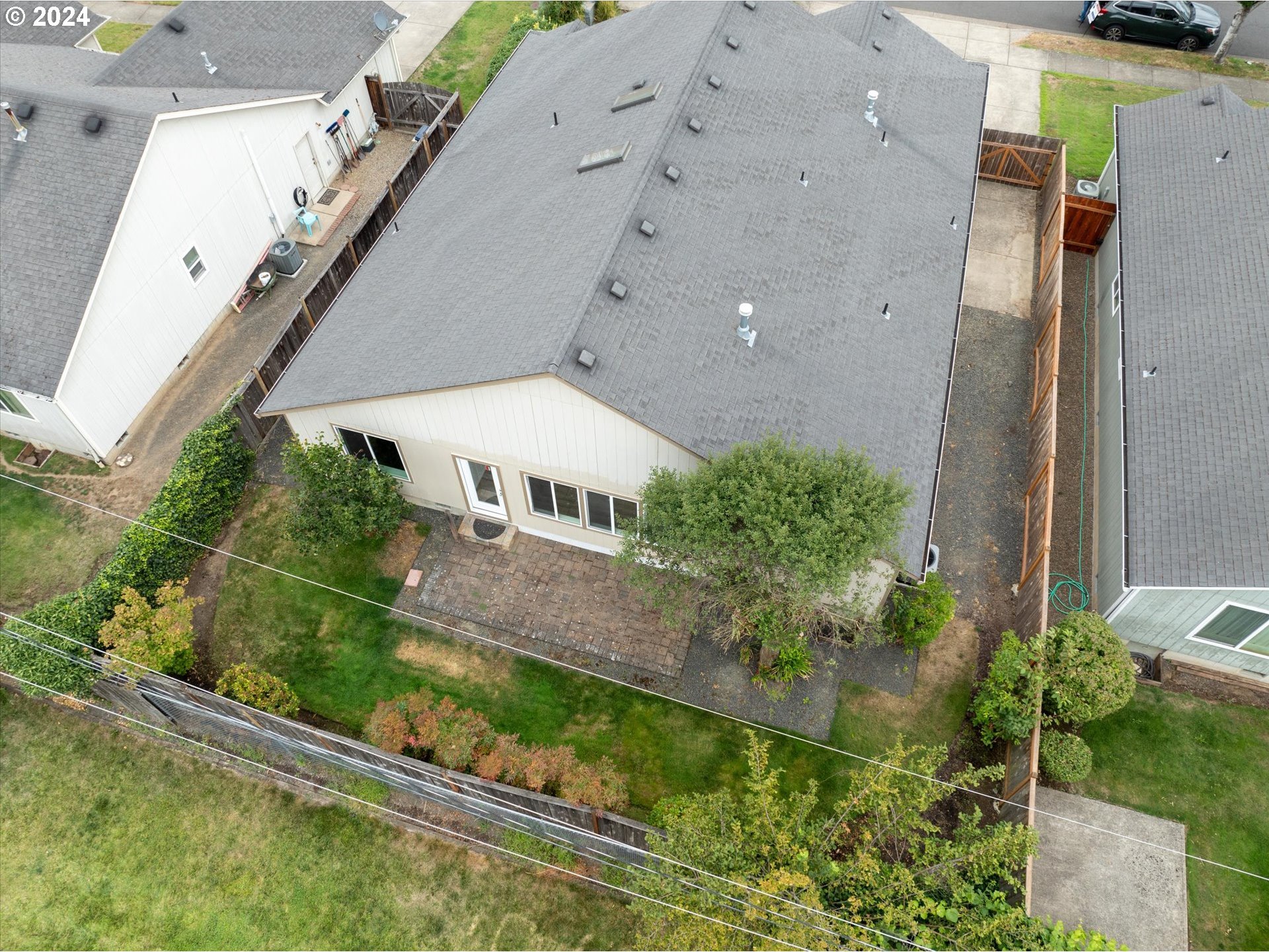 654 62nd Street Springfield, OR 97478 - Photo 37 of 41 an aerial view of a house with a yard