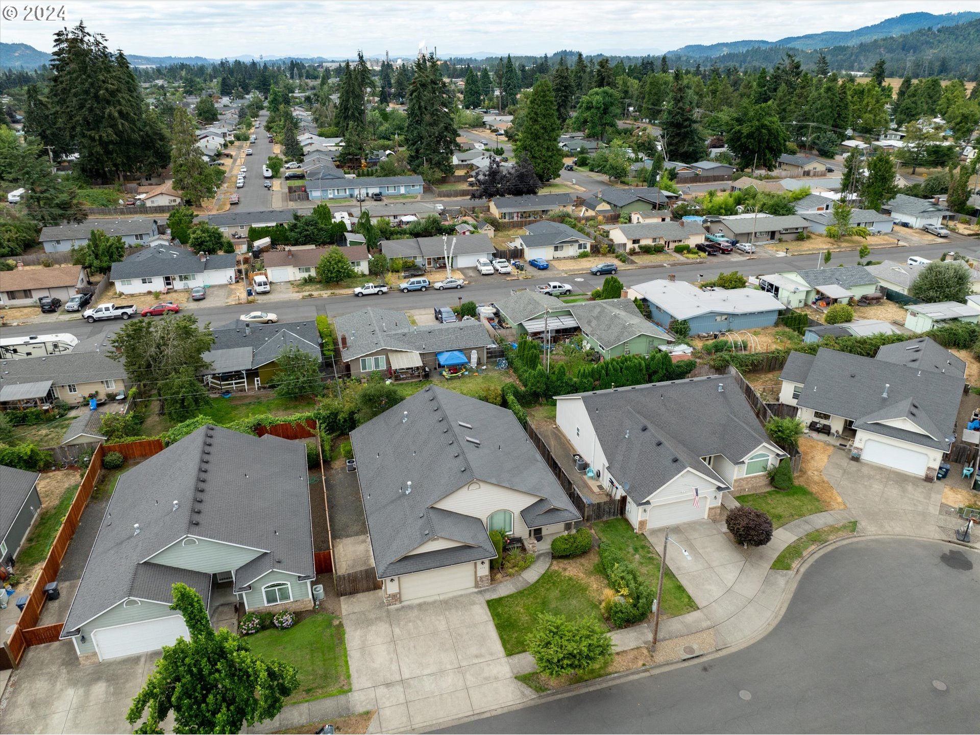654 62nd Street Springfield, OR 97478 - Photo 38 of 41 an aerial view of a city with lots of residential buildings