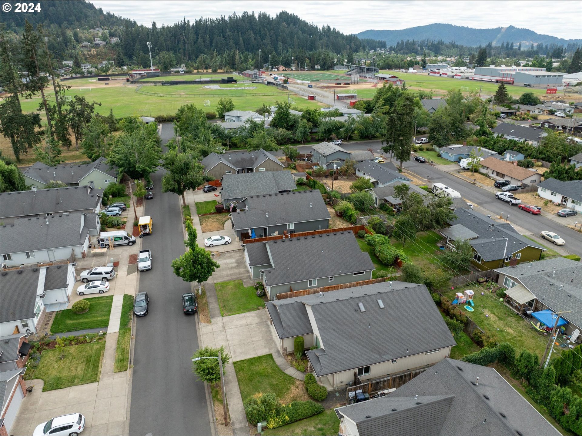654 62nd Street Springfield, OR 97478 - Photo 39 of 41 an aerial view of a house with a yard and lake view