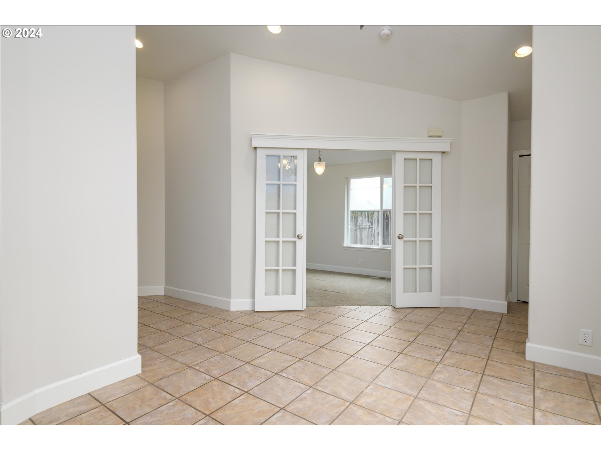 654 62nd Street Springfield, OR 97478 - Photo 8 of 41 a view of an empty room with wooden floor