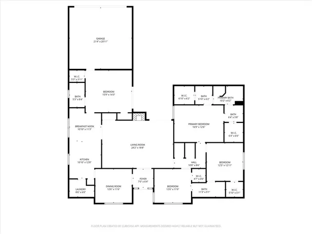 an aerial view of a house with outdoor space