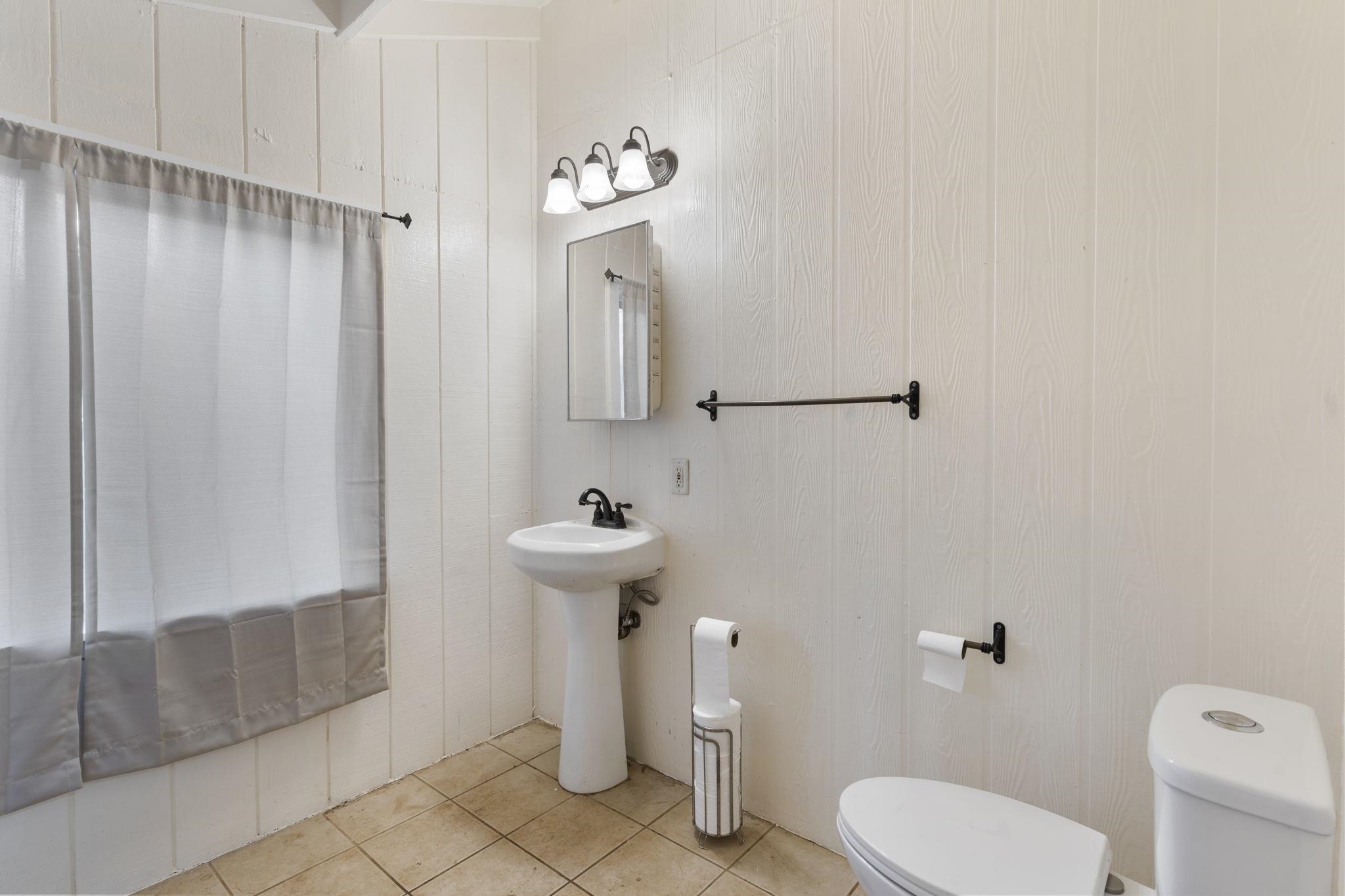 89 Nahele Road Haiku, HI 96708 - Photo 15 of 30 a bathroom with a sink toilet and shower