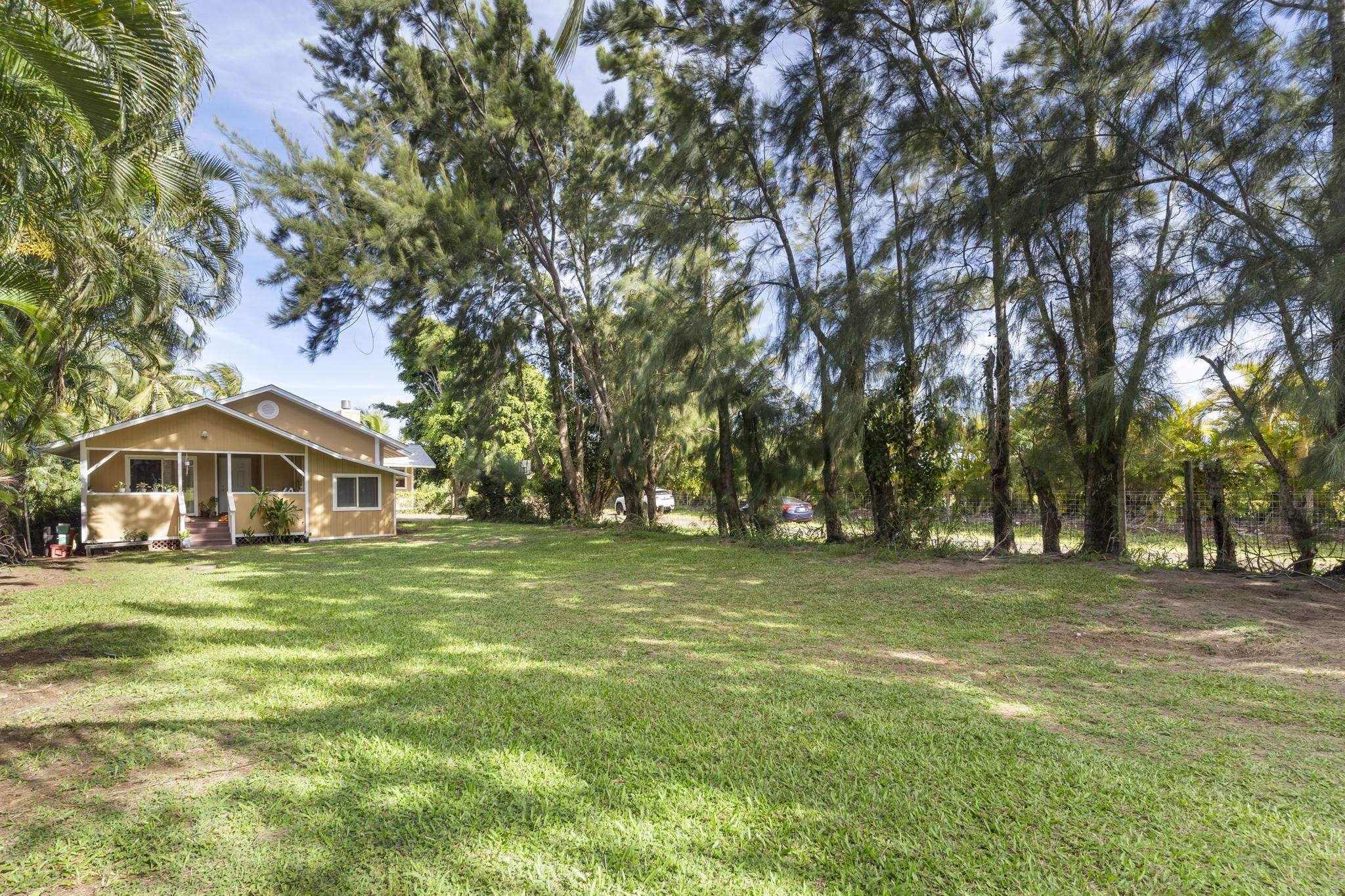 89 Nahele Road Haiku, HI 96708 - Photo 18 of 30 a front view of a house with a big yard