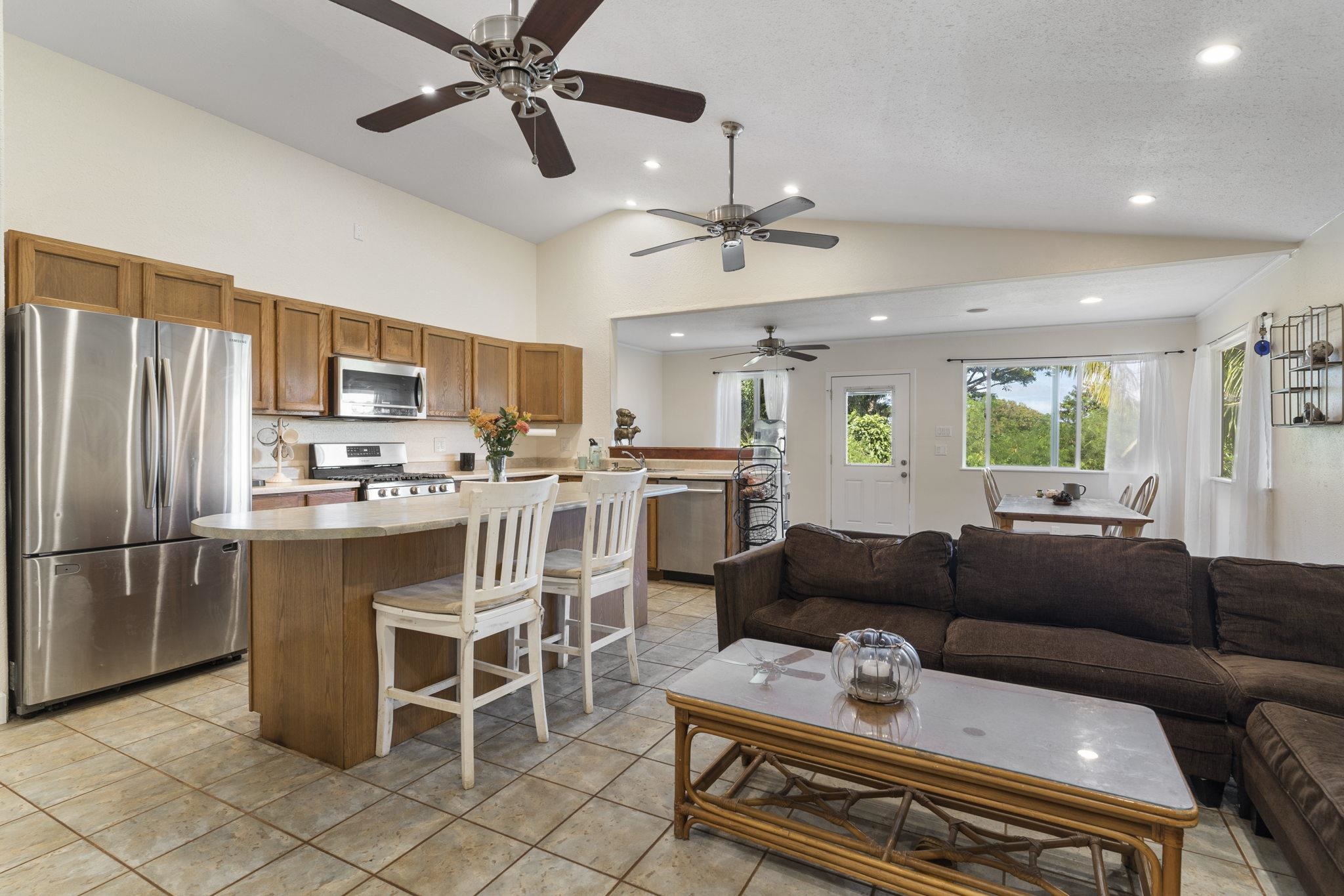 89 Nahele Road Haiku, HI 96708 - Photo 6 of 30 a living room with stainless steel appliances furniture and a kitchen view