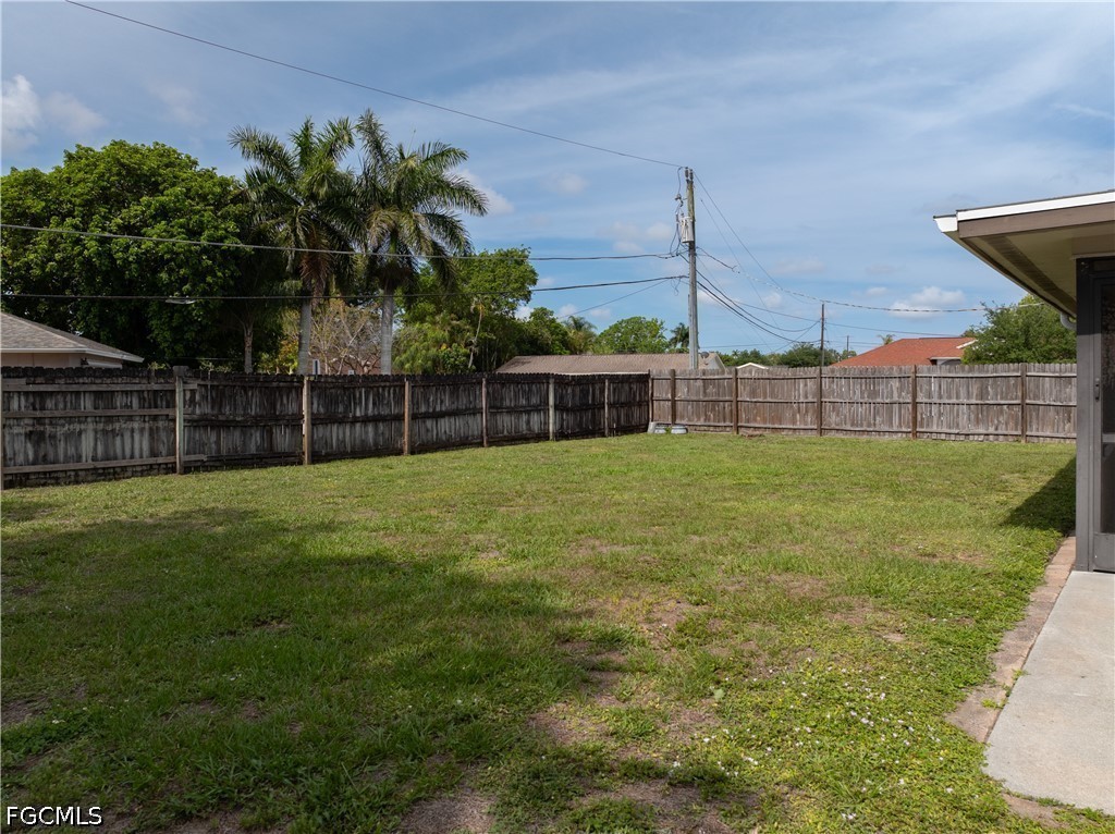 4960 20th Place Southwest Naples, FL 34116 - Photo 25 of 33 a view of a backyard with a garden and plants