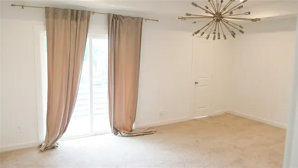 a view of a bathtub in a bathroom