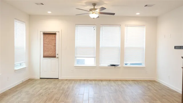 a stove top oven sitting inside of a kitchen