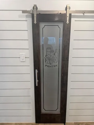 a view of hallway with wooden floor