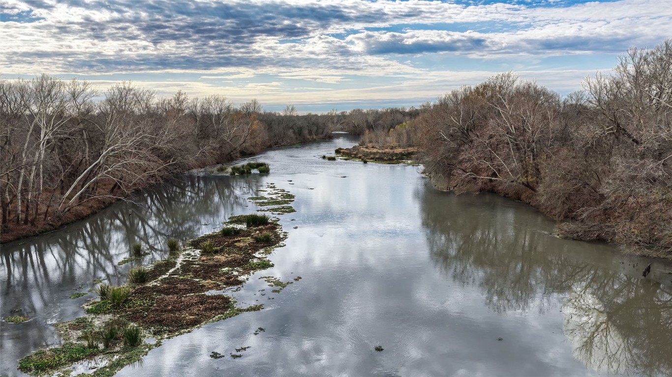 256 Greasy Bend Road Smithville, TX 78957 - Photo 16 of 36 Water view with a forest