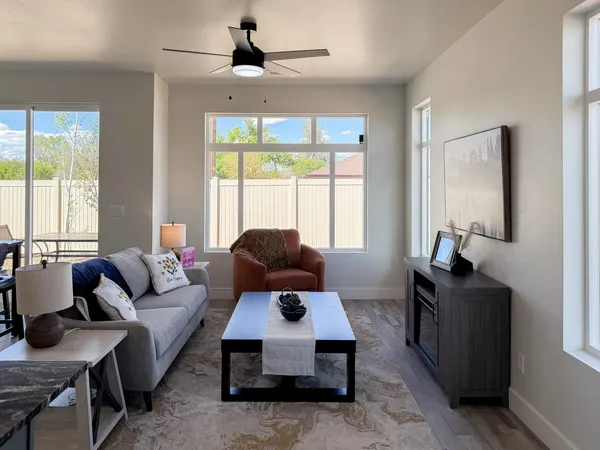a living room with furniture and a window