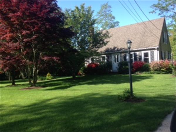 689 Walnut Plain Road Rochester, MA 02770 - Photo 1 of 22 a view of house with a yard
