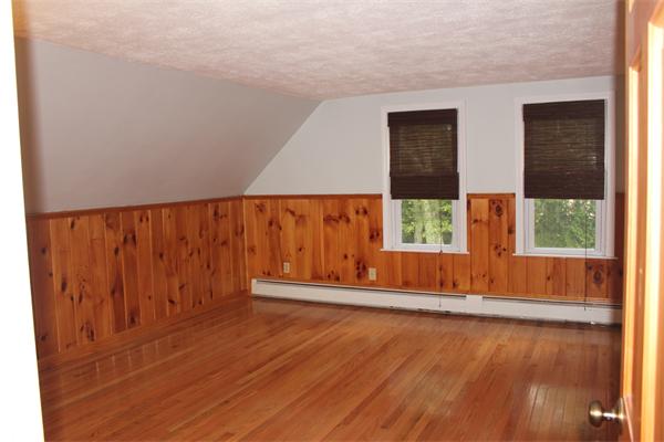 689 Walnut Plain Road Rochester, MA 02770 - Photo 14 of 22 a view of wooden floor and brick walls