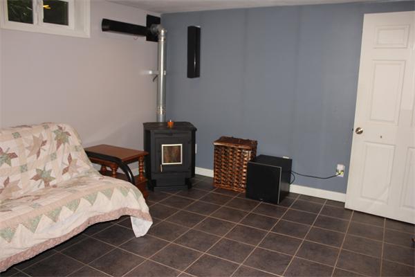 689 Walnut Plain Road Rochester, MA 02770 - Photo 17 of 22 a bedroom with a bed and a window
