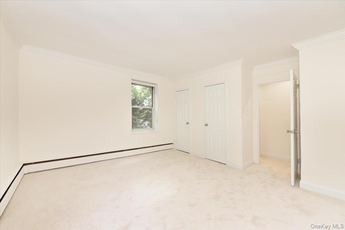 195 South Middle Neck Road, Unit 2L Great Neck, NY 11021 - Photo 13 of 36 a view of an empty room