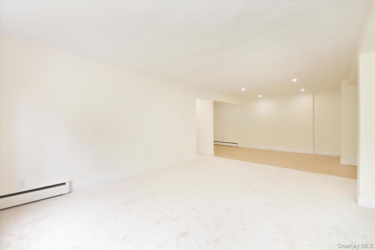 195 South Middle Neck Road, Unit 2L Great Neck, NY 11021 - Photo 5 of 36 a view of an empty room