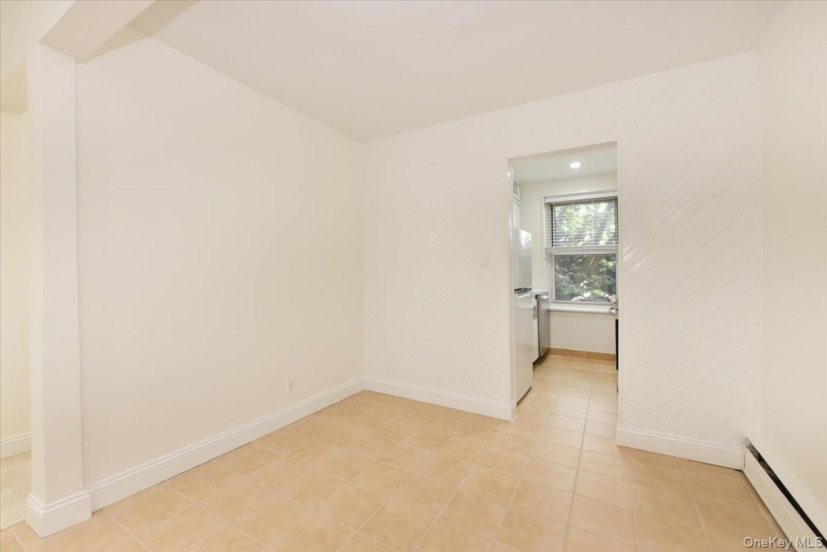 195 South Middle Neck Road, Unit 2L Great Neck, NY 11021 - Photo 9 of 36 a view of a room with a utility room