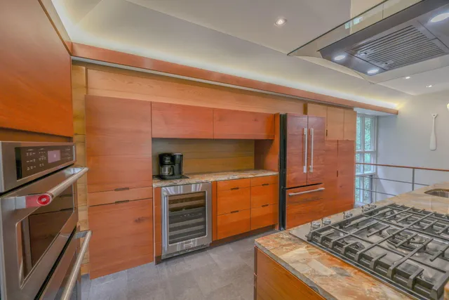 a kitchen with a stove and a microwave