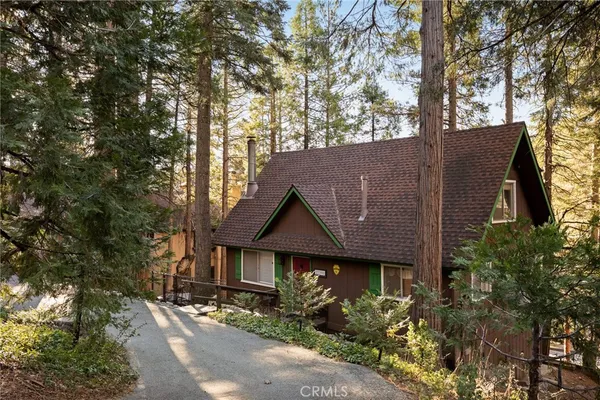 a house with trees in front of it