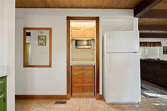 a view of a hallway with front door