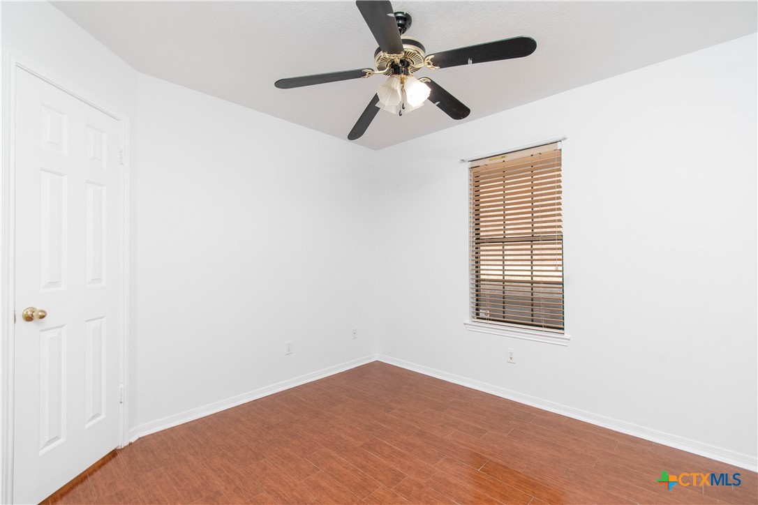 5420 Williams Drive Temple, TX 76502 - Photo 18 of 24 a view of an empty room with a window