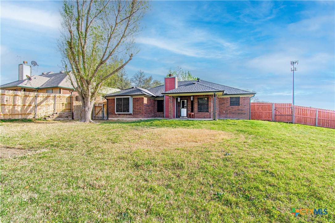 5420 Williams Drive Temple, TX 76502 - Photo 24 of 24 a front view of a house with a garden