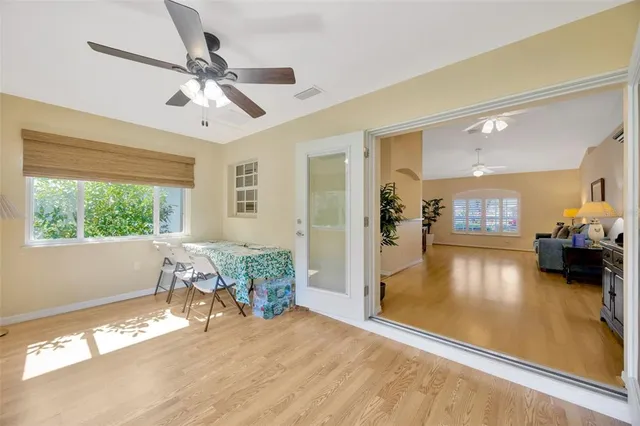 a view of a livingroom with furniture and a window