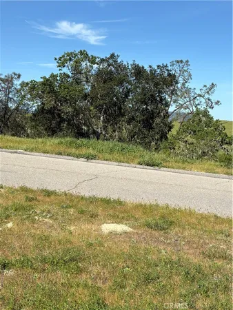 a view of an ocean and a mountain