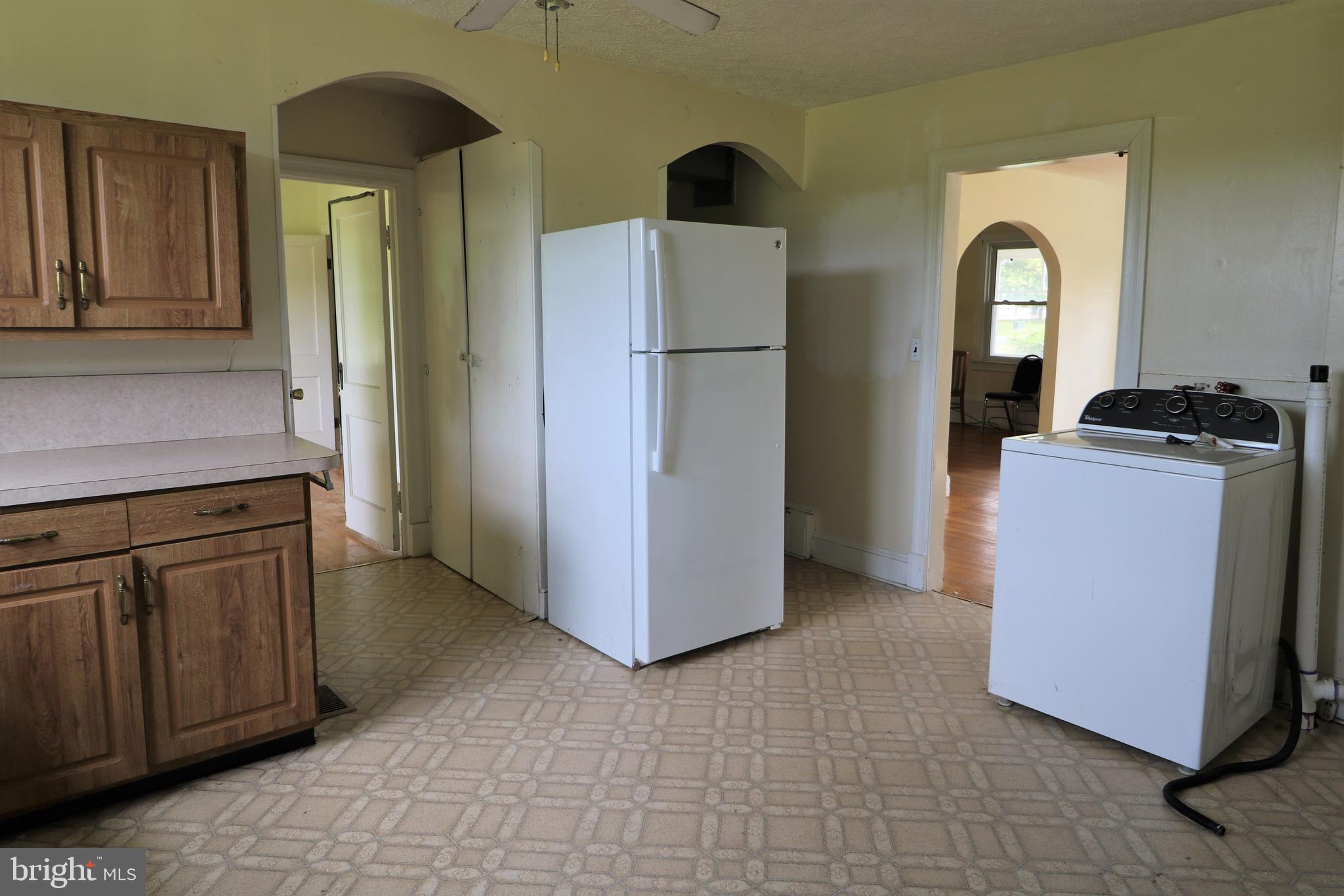 10955 H G Trueman Road Lusby, MD 20657 - Photo 33 of 53 Kitchen-middle door to Basement