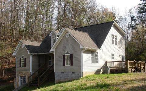 569 Bullen Gap Road Blue Ridge, GA 30513 - Photo 1 of 1 a view of a house with a yard