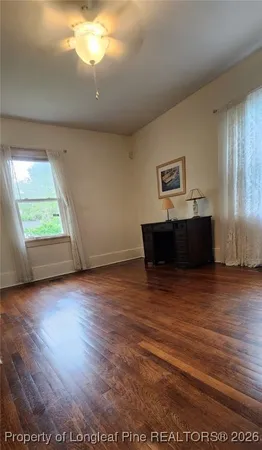 a view of kitchen and wooden floor