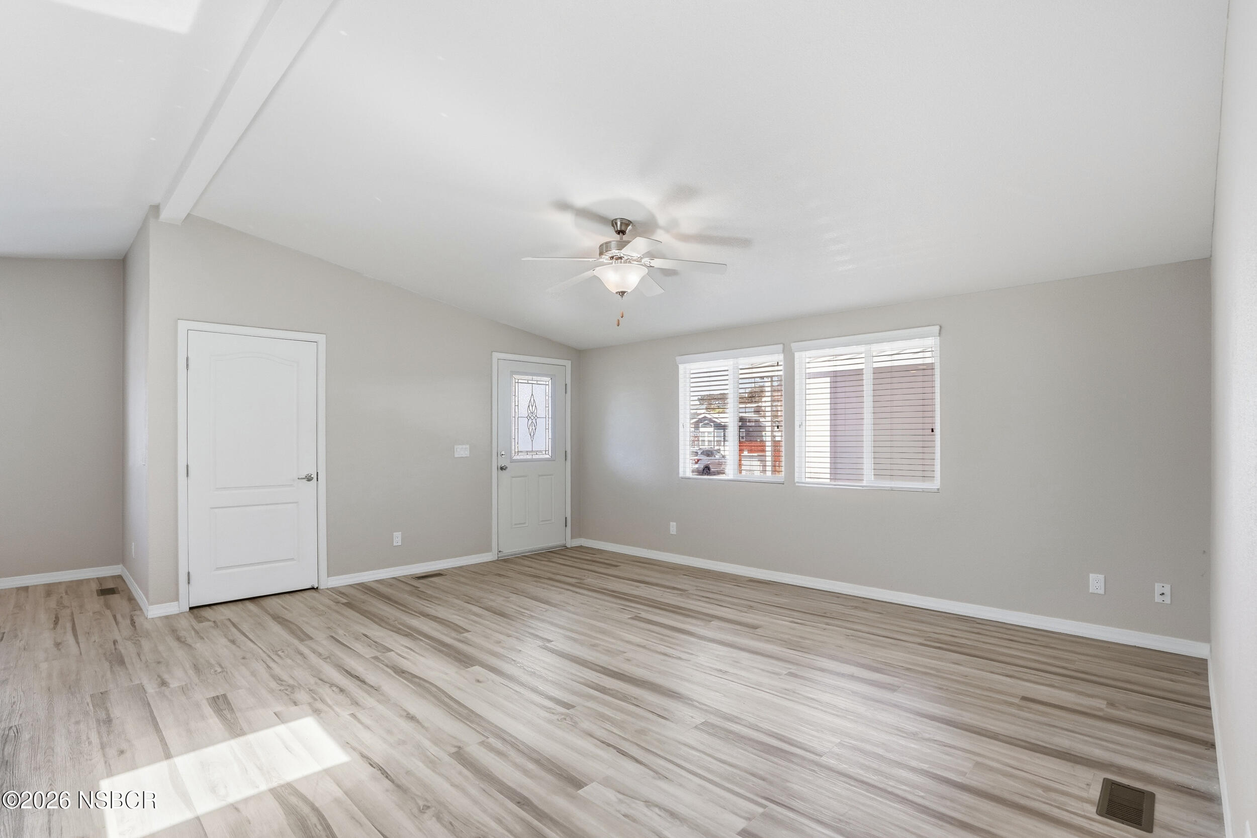 500 Atascadero Road, Unit M3 Morro Bay, CA 93442 - Photo 17 of 29 wooden floor in an empty room with a window