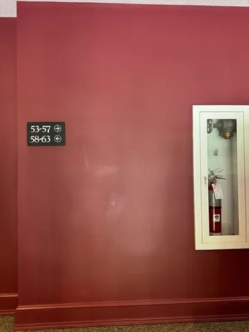 a view of elevator with hallway