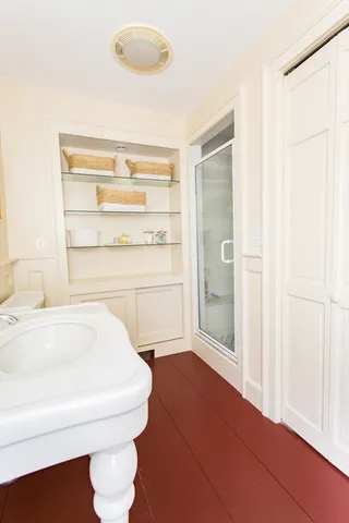 a view of a balcony with furniture