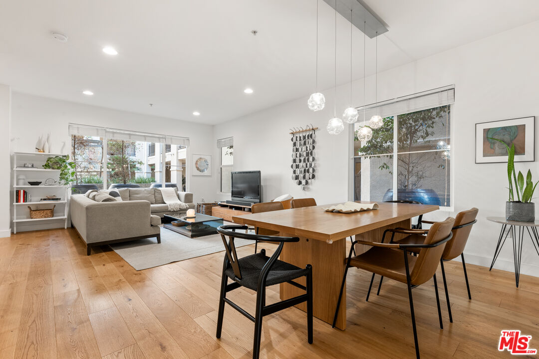 6020 South Seabluff Drive, Unit 131 Playa Vista, CA 90094 - Photo 6 of 30 a view of a dining room with furniture and wooden floor