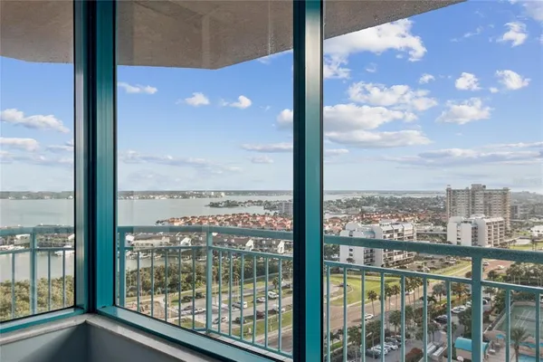 a spacious bathroom with a granite countertop double vanity sink and a mirror